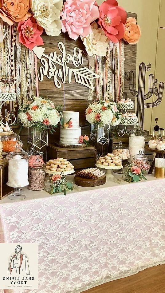25 Chic Baby Shower Outfits for Guests That Are Totally On-Trend Right Now 2 The Floral Wrap Dress