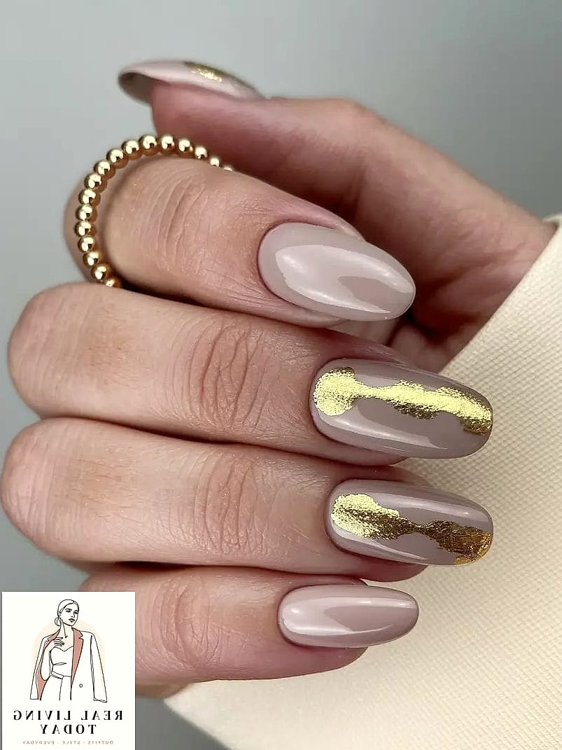 25 Fall Nail Ideas Worth Bookmarking Right Now 13 Nude with Gold Foil Accents