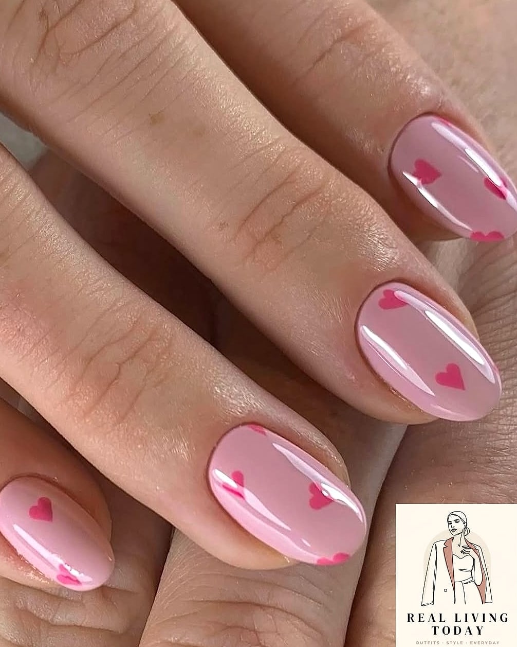 25 Pink Nail Ideas for Every Mood and Skill Level — Your Next Manicure Is Here 17 Pink Nails with Heart Details