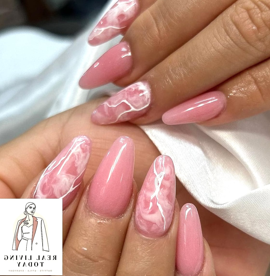 25 Pink Nail Ideas for Every Mood and Skill Level — Your Next Manicure Is Here 12 Pink and White Marble Nails