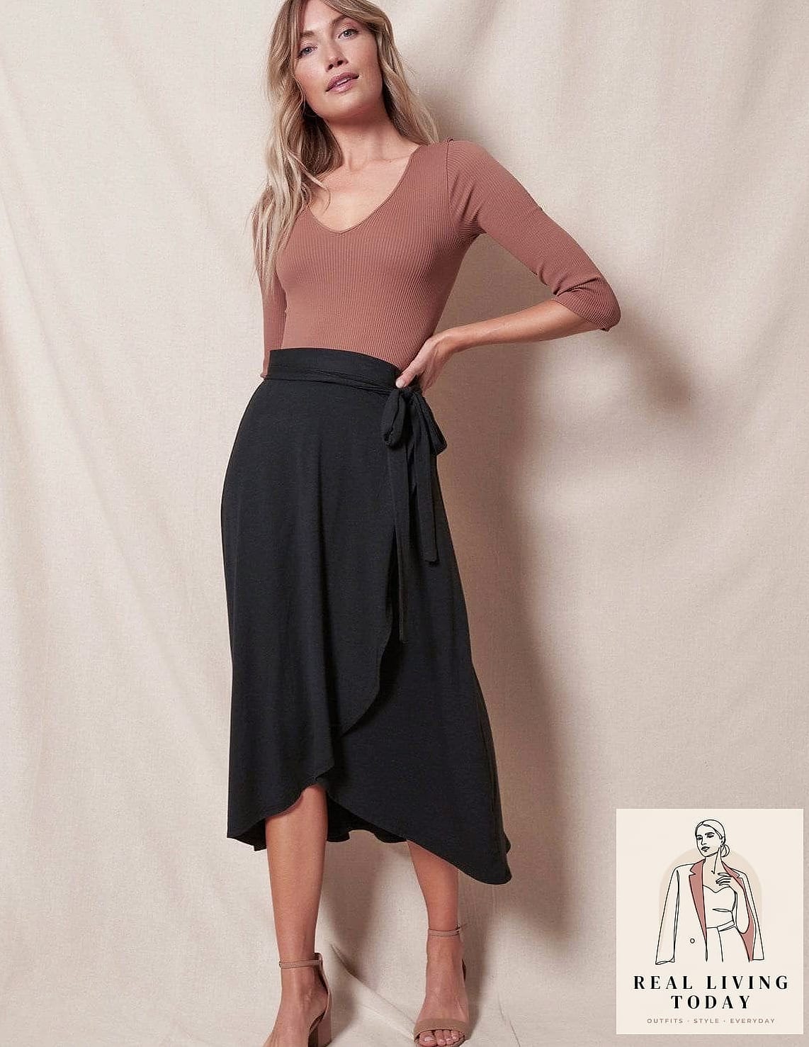 30 Outfits With Black Skirt That Are Seriously Stylish Right Now 8 Wrap Top and A-Line Black Skirt